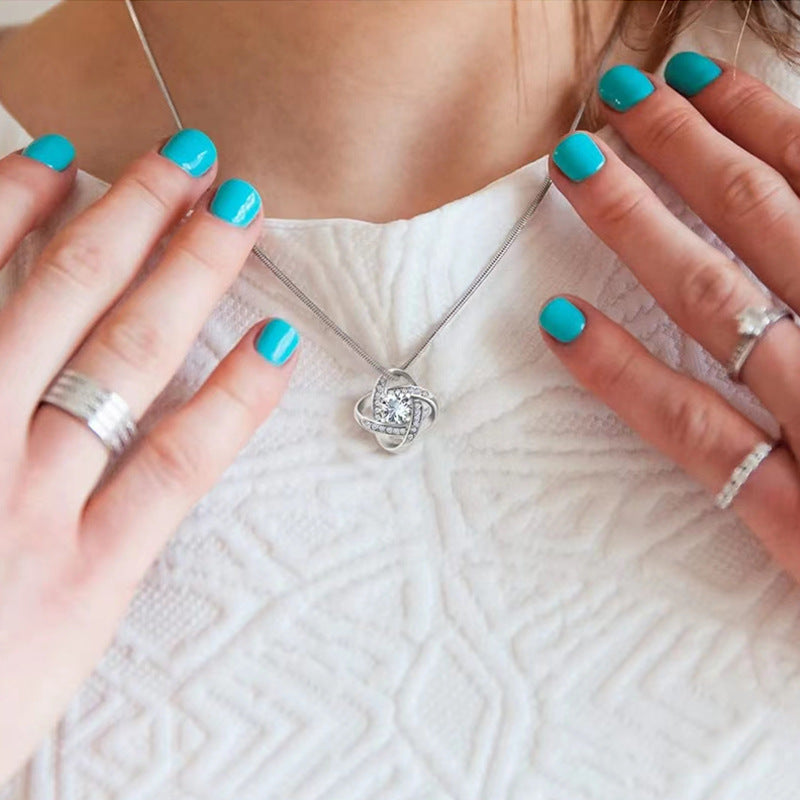 Through Every Storm - Eternal Knot Necklace